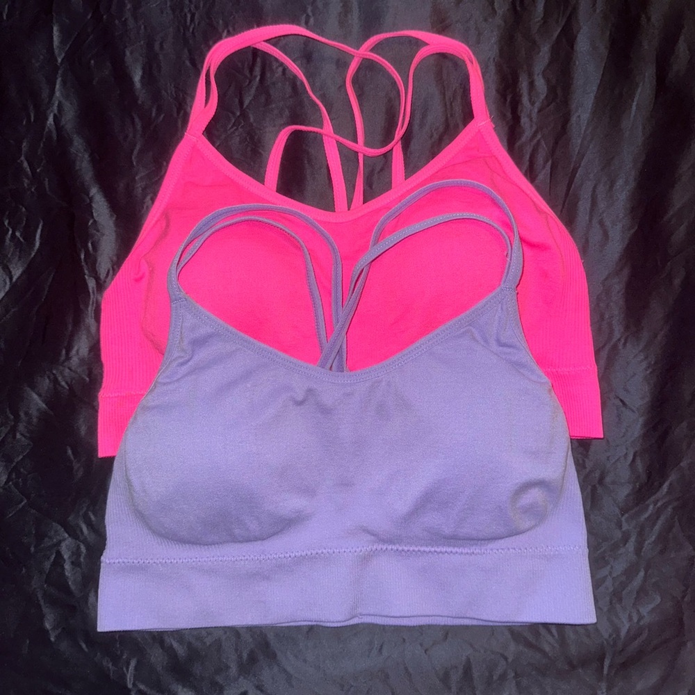 Pink and purple sports bras